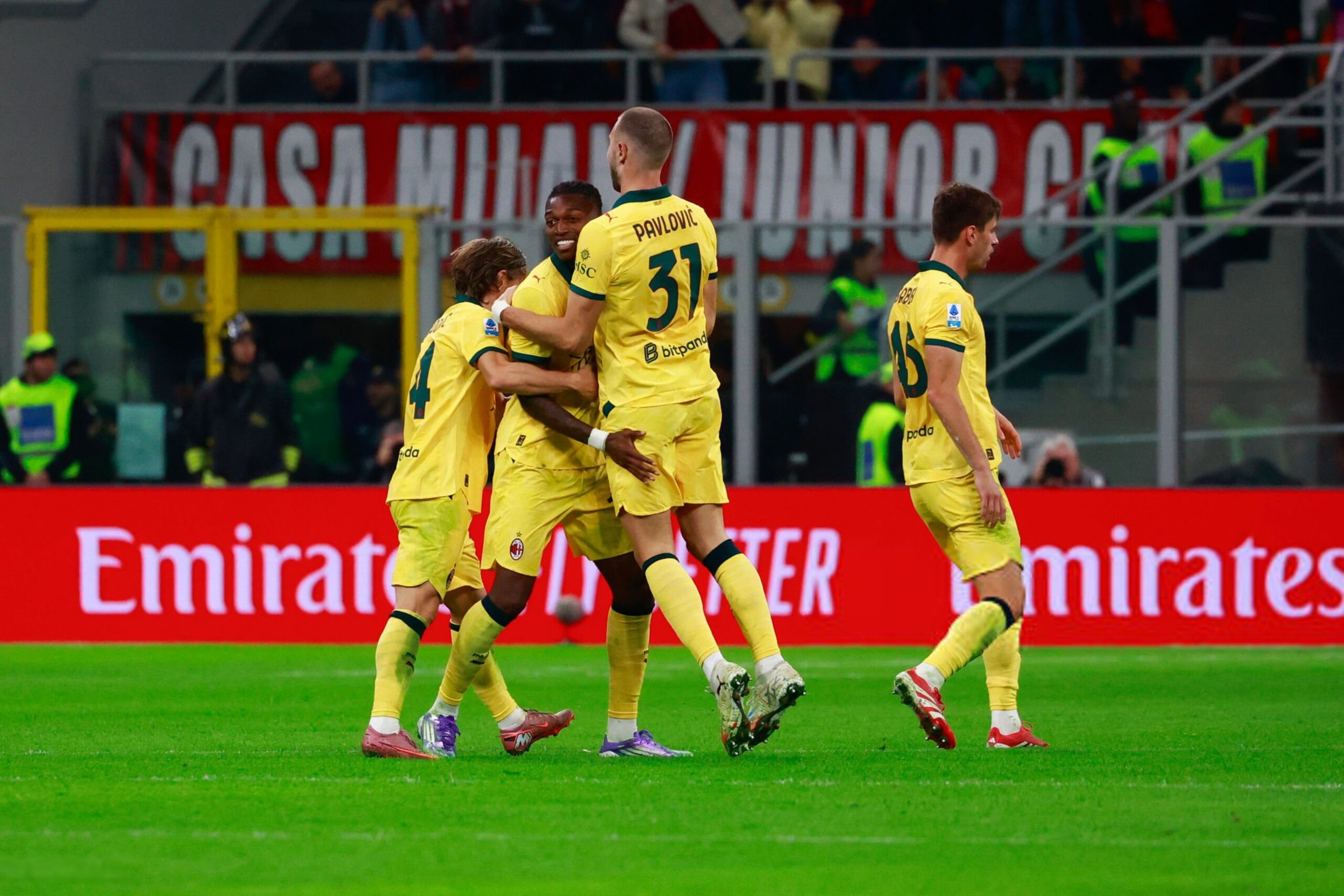 Rafael Leao celebrates with his AC Milan teammates