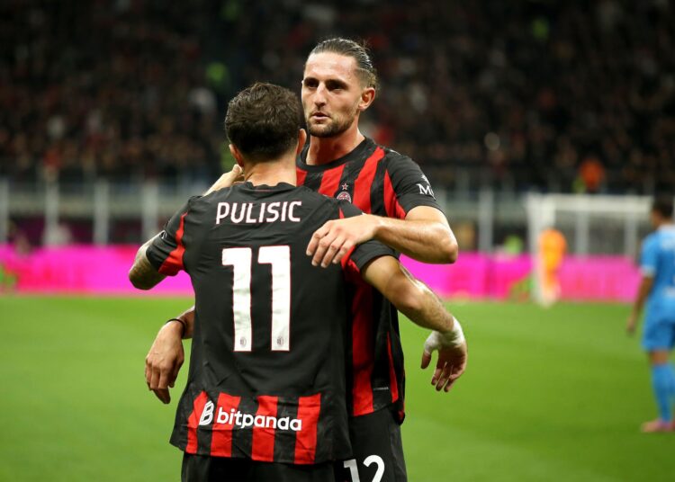 Christian Pulisic and Adrien Rabiot of AC Milan