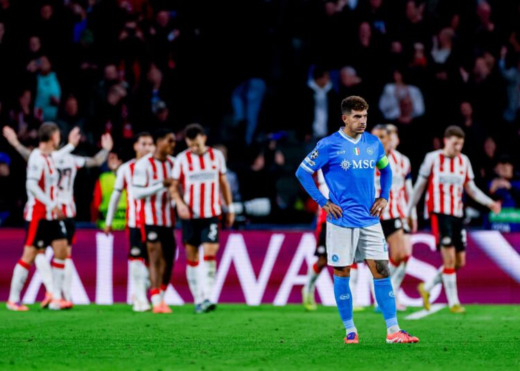 Giovanni Di Lorenzo of SSC Napoli looks dejected after conceding his sides fourth goal during the UEFA Champions League 2025/26 League Phase MD3 match between PSV Eindhoven and SSC Napoli at PSV Stadion on October 21, 2025 in Eindhoven, Netherlands. (Photo by Marcel ter Bals/DeFodi Images/DeFodi via Getty Images)