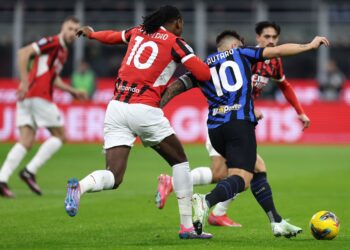 Rafael Leao of Ac Milan (L) and Lautaro Martinez of Inter