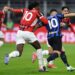 Rafael Leao of Ac Milan (L) and Lautaro Martinez of Inter