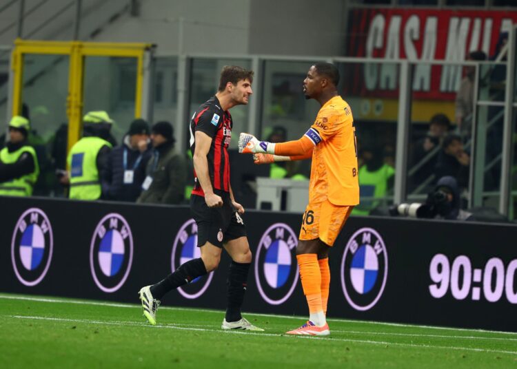 Matteo Gabbia and Mike Maignan (AC Milan via Getty Images)