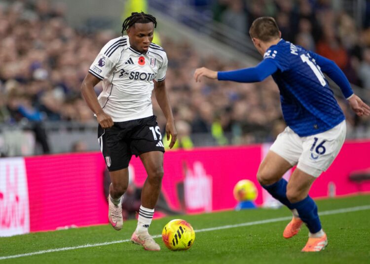 Samuel Chukwueze #19 of Fulham FC is challenged by Everton FC #16 Vitaliy Mykolenko during the Premier League match between Everton and Fulham at Hill Dickinson Stadium in Liverpool, England, on November 8, 2025. (Photo by Mike Morese/MI News/NurPhoto via Getty Images)