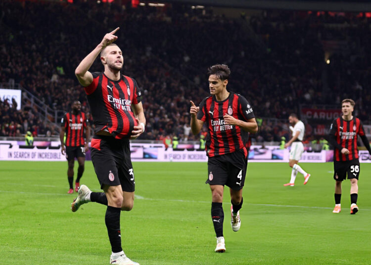 Strahinja Pavlovic and Samuele Ricci of AC Milan