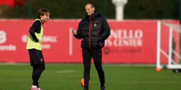 Massimiliano Allegri and Luka Modric of AC Milan