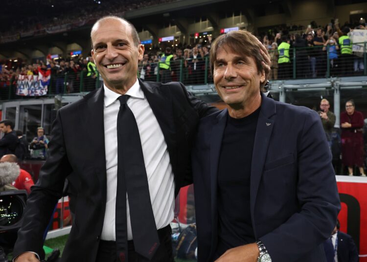 Head coach AC Milan Massimiliano Allegri shakes hands with head coach SSC Napoli Antonio Conte during the Serie A match between AC Milan and SSC Napoli at Giuseppe Meazza Stadium on September 28, 2025 in Milan, Italy. (Photo by Claudio Villa/AC Milan via Getty Images)