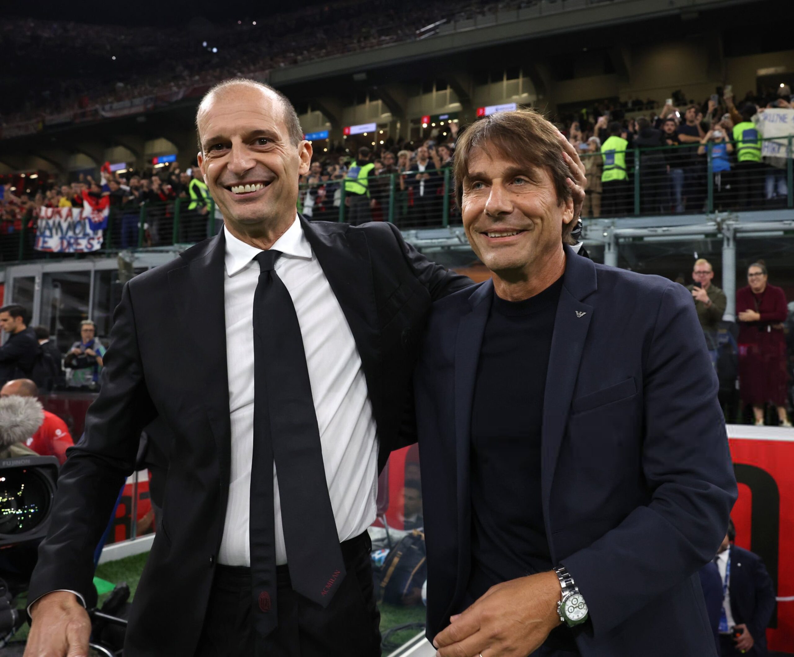 Head coach AC Milan Massimiliano Allegri shakes hands with head coach SSC Napoli Antonio Conte during the Serie A match between AC Milan and SSC Napoli at Giuseppe Meazza Stadium on September 28, 2025 in Milan, Italy. (Photo by Claudio Villa/AC Milan via Getty Images)