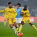 Koni De Winter and Fikayo Tomori of AC Milan during a match against Lazio