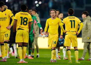 AC Milan players looking dejected