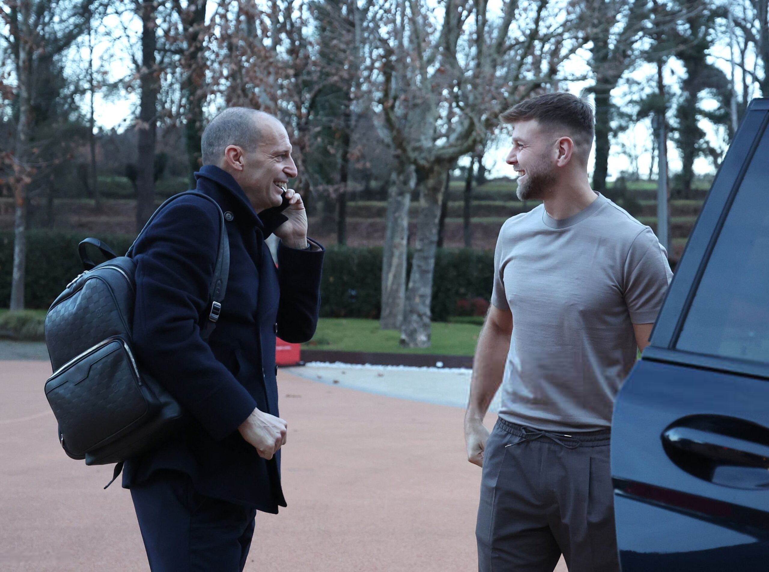 Allegri and Fullkrug of AC Milan