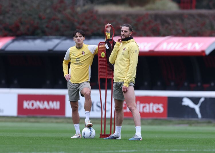 Samuele Ricci and Adrien Rabiot of AC Milan