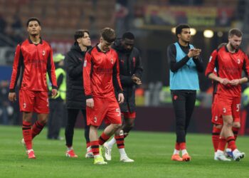 AC Milan players looking dejected