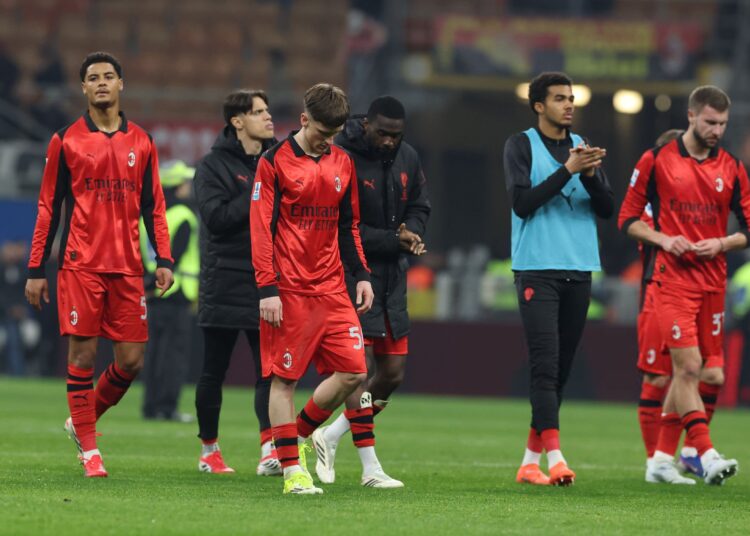 AC Milan players looking dejected
