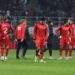 AC Milan players looking dejected