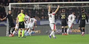AC Milan players celebrating against Pisa