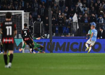 Lazio's Gustav Isaksen scores against AC Milan
