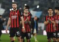 AC Milan players looking dejected after loss against Lazio