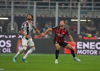 Niclas Fullkrug AC Milan and Lloyd Kelly of Juventus