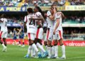 Adrien Rabiot of AC Milan celebrates with teammates after scoring against Hellas Verona