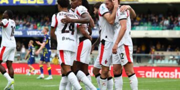 Adrien Rabiot of AC Milan celebrates with teammates after scoring against Hellas Verona