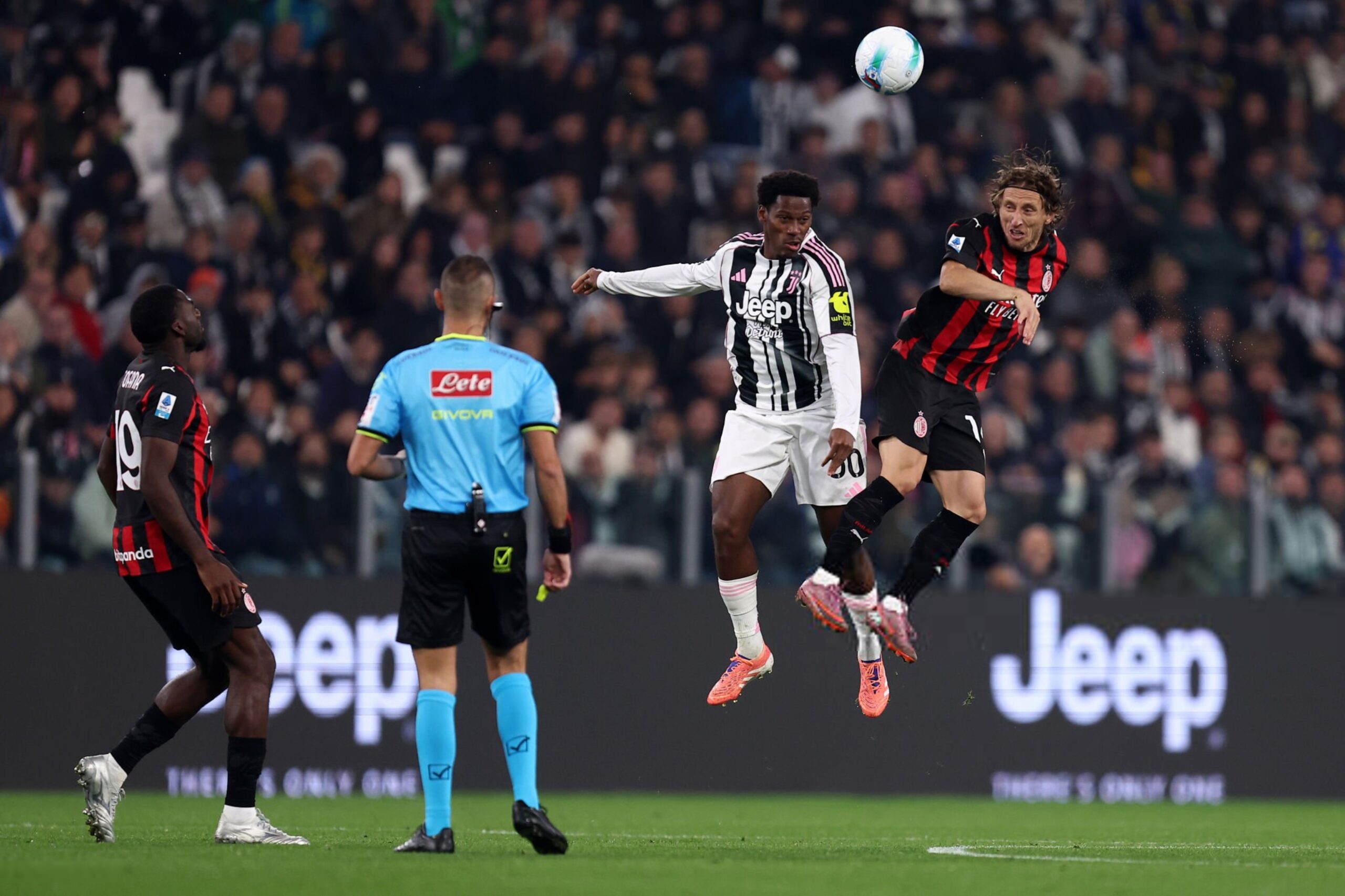 Luka Modric of AC Milan and Jonathan David of Juventus