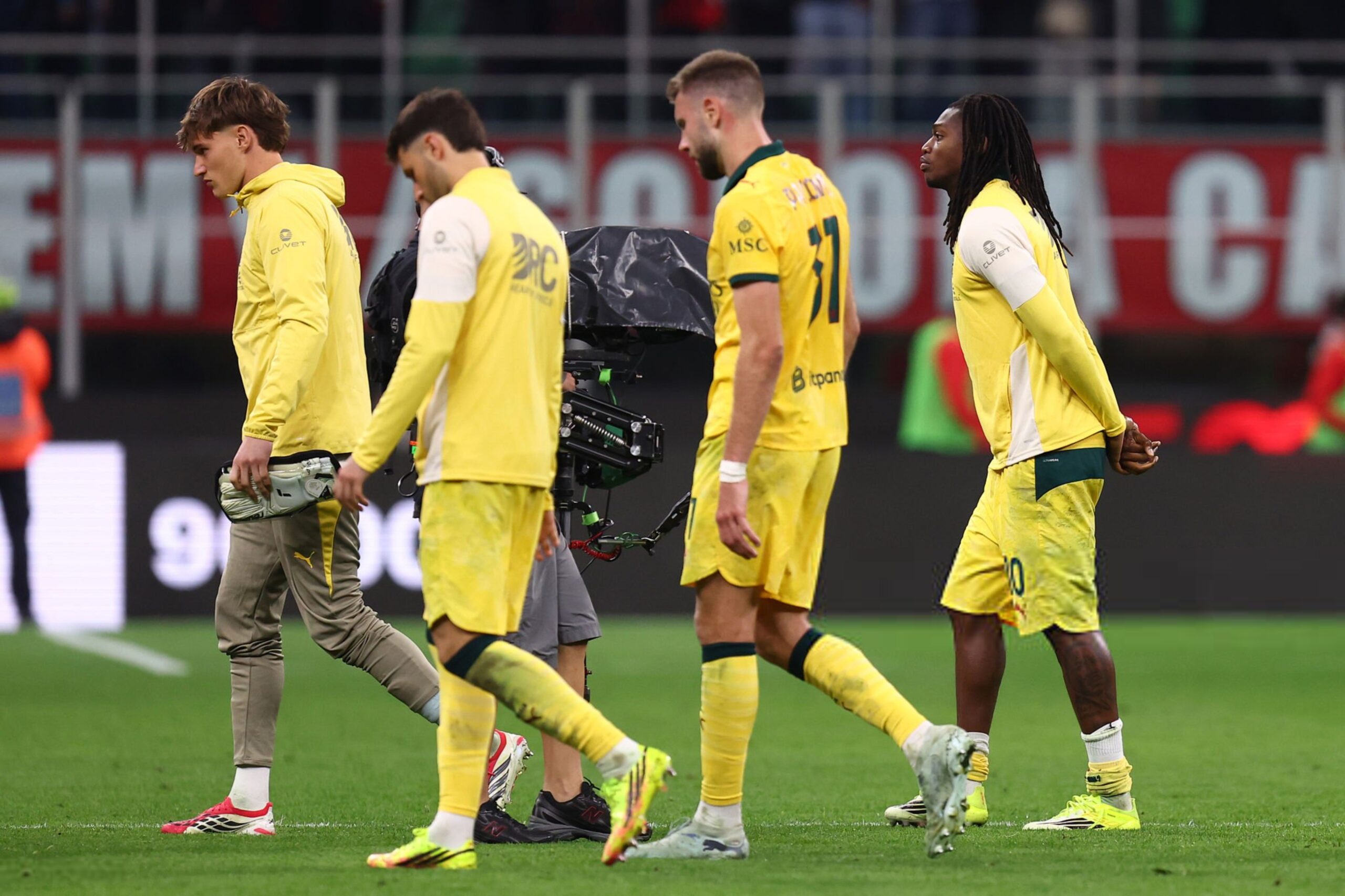 AC Milan players looking dejected