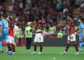 AC Milan players looking dejected