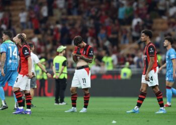 AC Milan players looking dejected