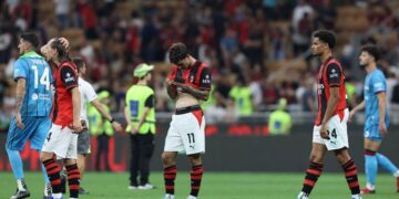 AC Milan players looking dejected
