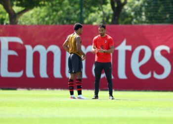 Ruben Amorim and Zachary Athekame of AC Milan