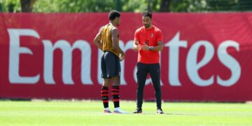 Ruben Amorim and Zachary Athekame of AC Milan