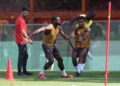 Youssouf Fofana and Christopher Nkunku of AC Milan