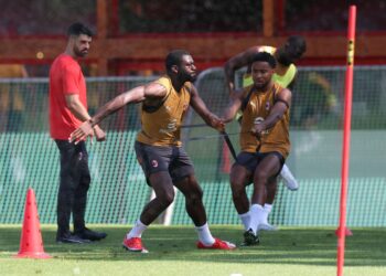 Youssouf Fofana and Christopher Nkunku of AC Milan