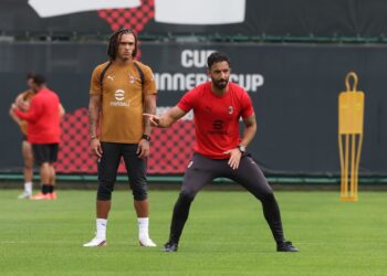 Ruben Amorim and Diego Moreira of AC Milan