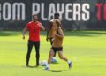 Ruben Amorim and Luka Modric of AC Milan