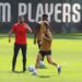 Ruben Amorim and Luka Modric of AC Milan