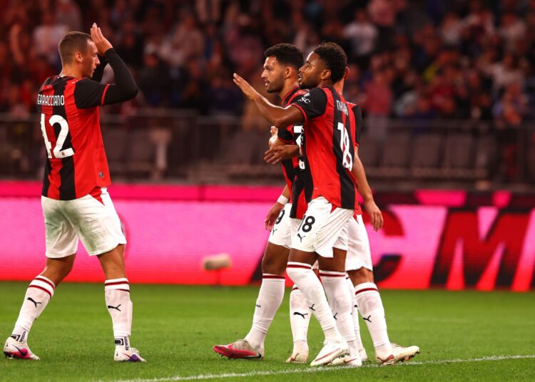 Christopher Nkunku celebrates with teammates