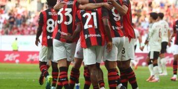 The Rossoneri players celebrate against Manchester United (AC Milan via Getty Images)