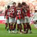The Rossoneri players celebrate against Manchester United (AC Milan via Getty Images)