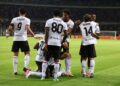 Alphadjo Cisse of AC Milan celebrates with team-mates after scoring the opening goal during the Serie A match between Torino FC and AC Milan at Stadio Olimpico Grande Torino on August 23, 2026 in Turin, Italy. (Photo by Claudio Villa/AC Milan via Getty Images)