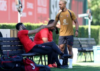 Omari Hutchinson and Ruben Amorim of AC Milan