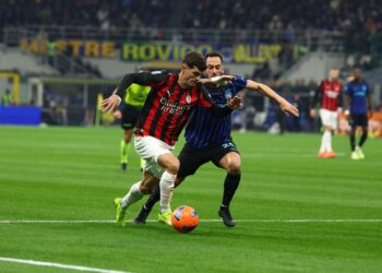 Christian Pulisic of AC Milan and Hakan Calhanoglu of Inter