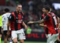 Adrien Rabiot and Christian Pulisic celebrate during AC Milan - Atalanta match