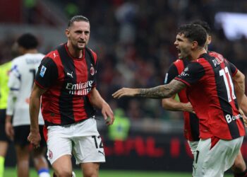 Adrien Rabiot and Christian Pulisic celebrate during AC Milan - Atalanta match