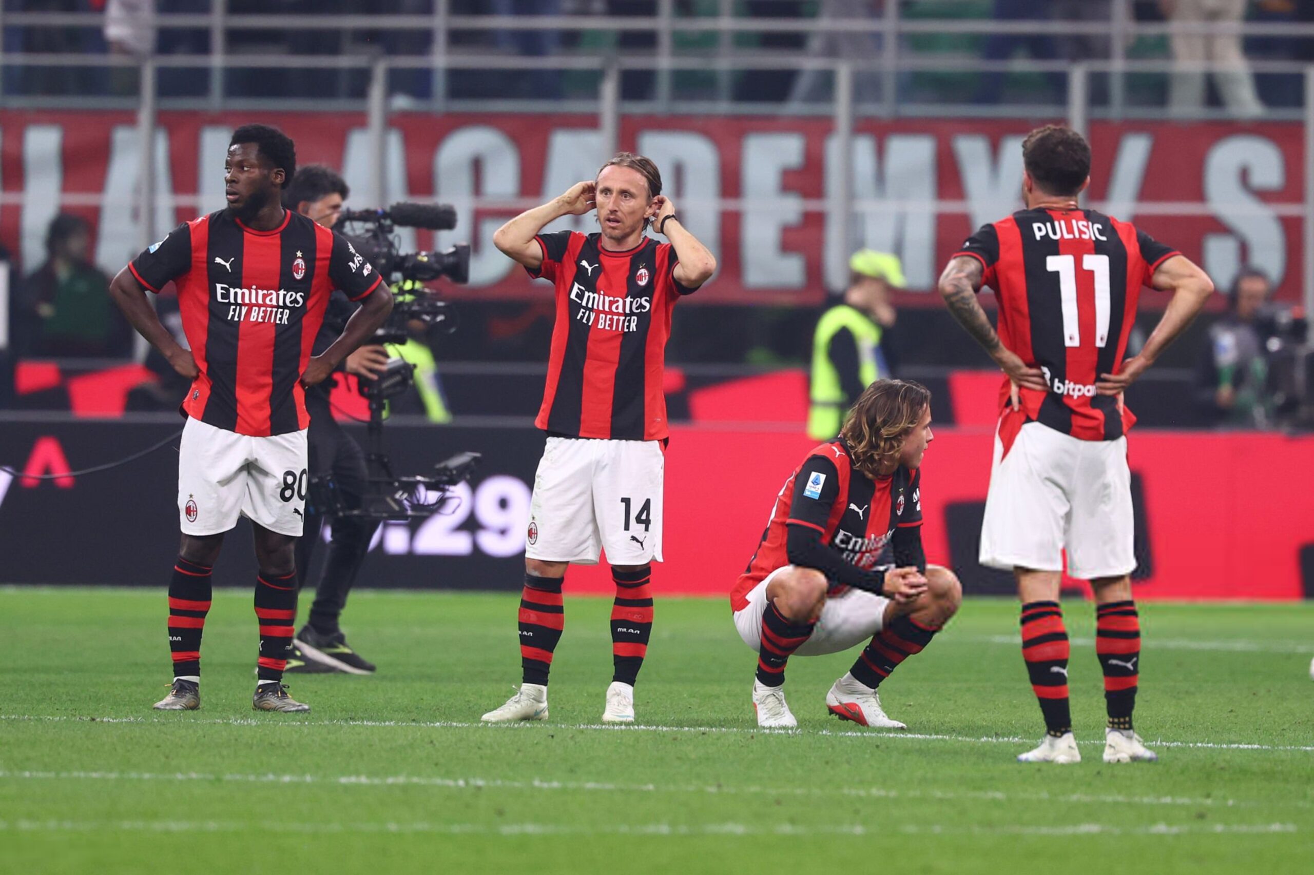 AC Milan players looking djected