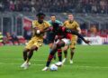 Sankhoun Diawara of AC Milan battles for the ball with Samuel Mbangula of Bologna FC