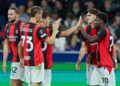 Alphadjo Cisse and AC Milan players