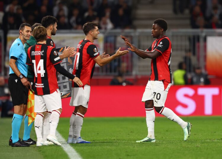 Alphadjo Cisse and Christian Pulisic of AC Milan