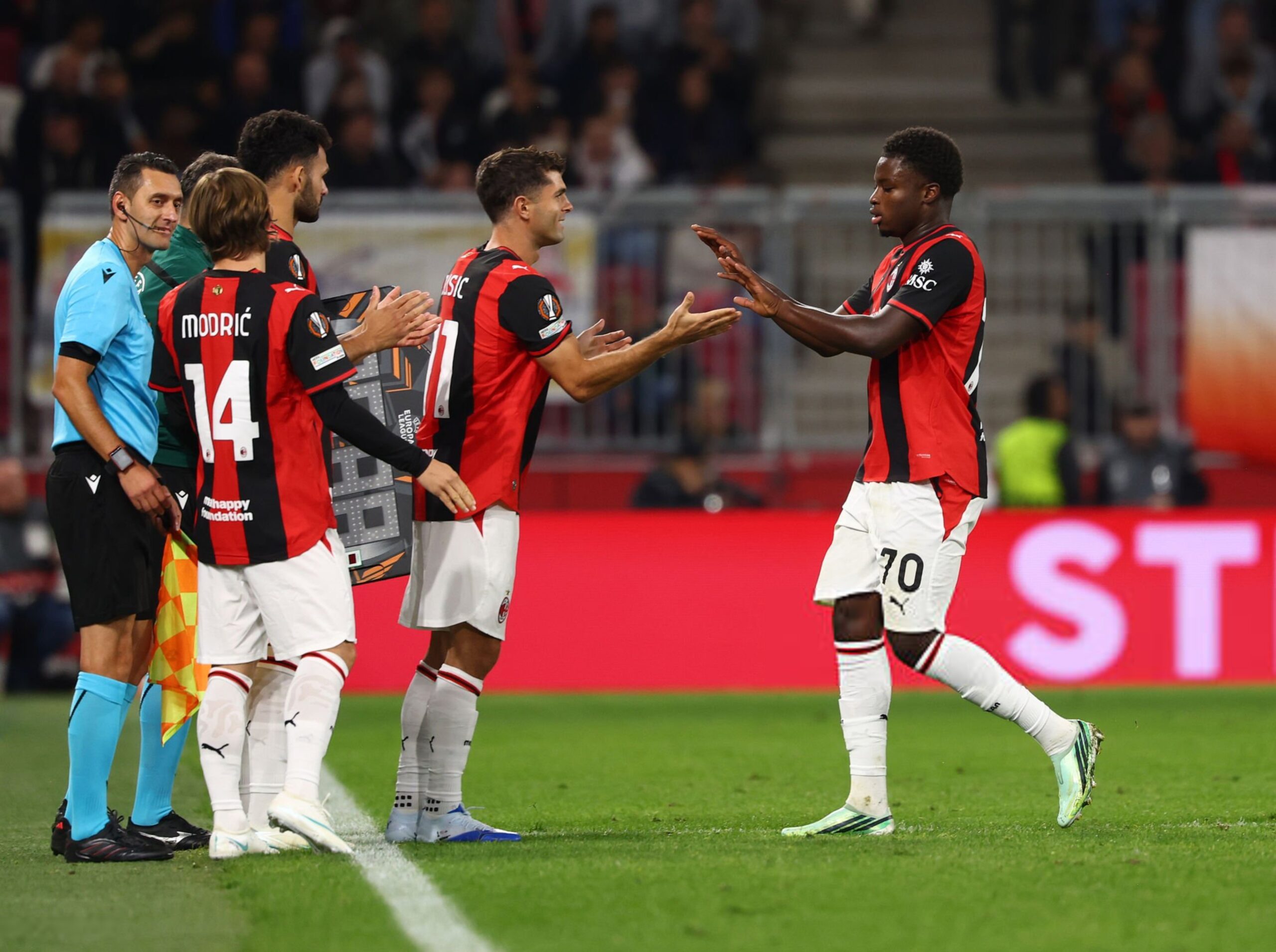 Alphadjo Cisse and Christian Pulisic of AC Milan