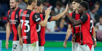 Alphadjo Cisse and AC Milan players